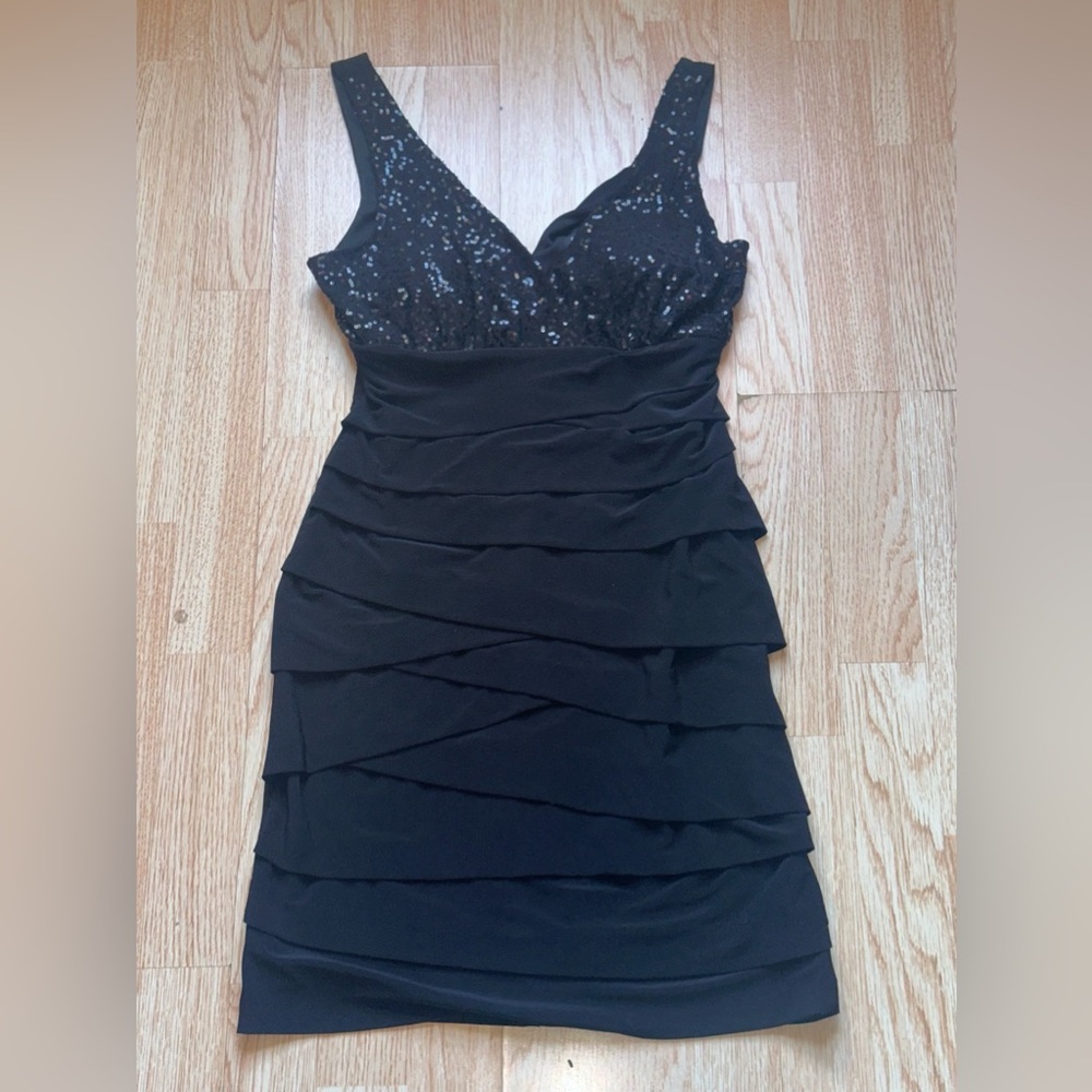 Women Size 8 Black sequin dress with ruffles, ideal for a special occasion